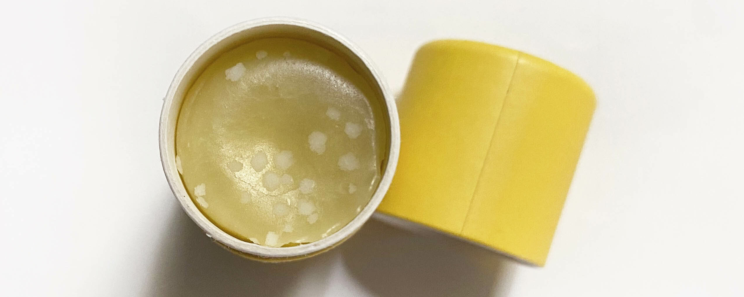 lip balm with grains white dot