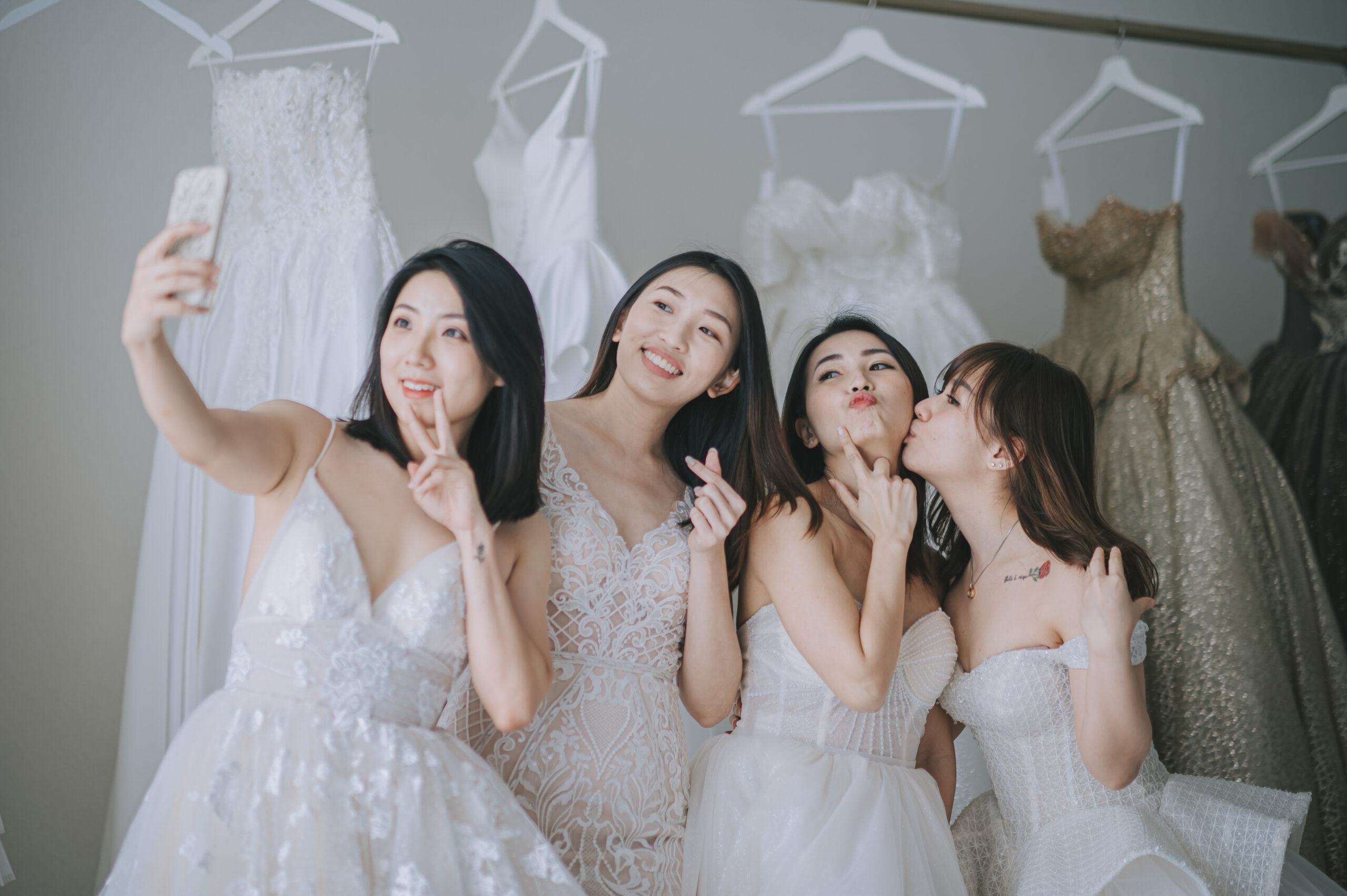 Bridesmaids wearing wedding dress